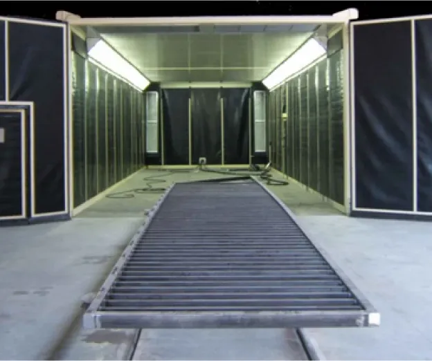 Locaux industriels permettant de grenailler et de peindre des éléments judqu'à 15 mètres de long chez PMSI à Ennery (95)